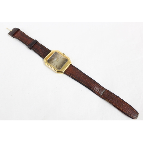 1339 - A retro mechanical Rotary watch with gold plated case, leather strap and original box