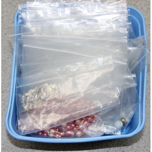 1188 - 3 tubs of assorted costume jewellery, and jewellery making odds, approx 2.5kg gross