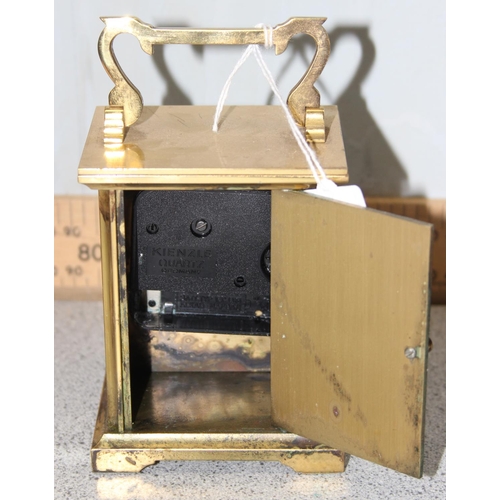 1360 - A vintage Angelus brass cased carriage clock and and unusual mirrored glass and wooden stand