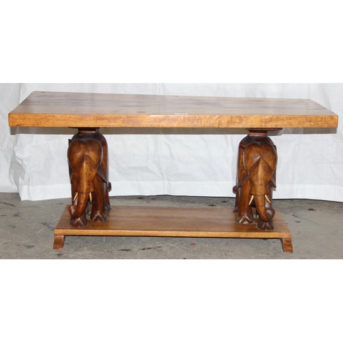 159 - Mid-century hardwood coffee table with elephant supports