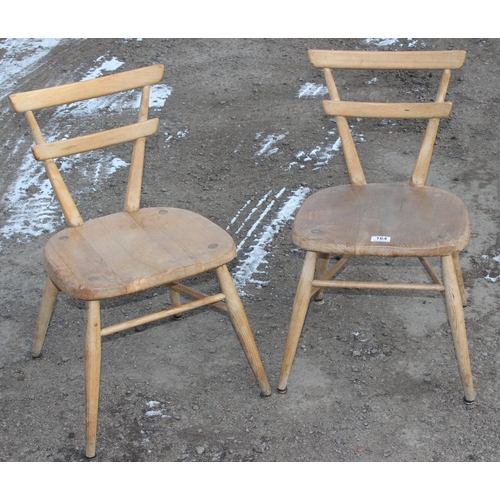 164 - A pair of vintage blonde Ercol children's chairs