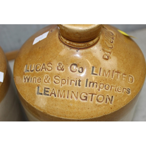 1875 - 7 assorted vintage stoneware advertising flagons, Witney, Brackley, Weston Super Mare, 2 Leamington ... 