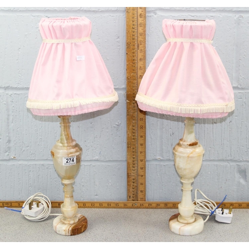 274 - A pair of turned onyx table lamps with shades