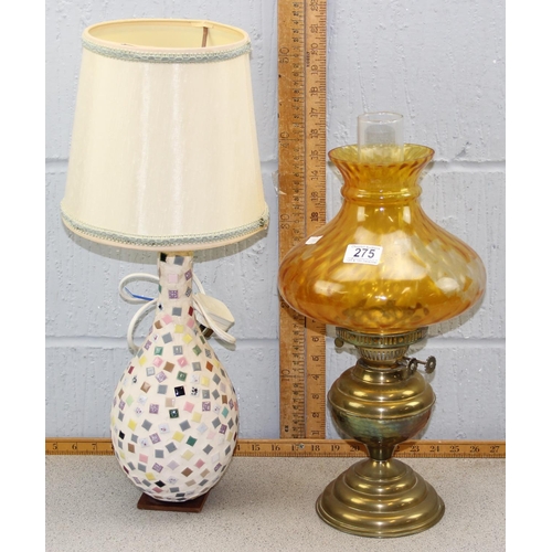 275 - A retro style table lamp and a vintage oil lamp with amber glass shade