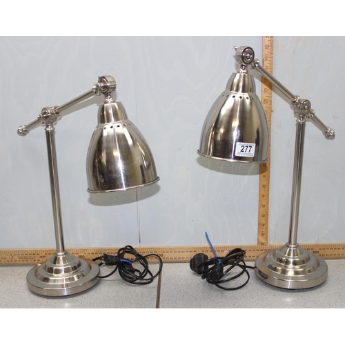 277 - A pair of Deco style chrome lamps