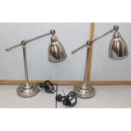 277 - A pair of Deco style chrome lamps