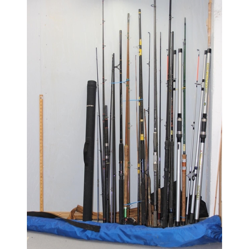 773 - A large qty of assorted fishing rods, split cane, carbon etc, bivvy tent etc