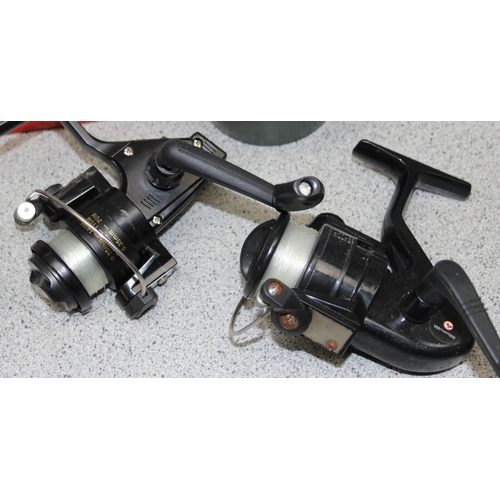 774 - 3 fishing reels, various fishing lines in case and 3 fly boxes and contents