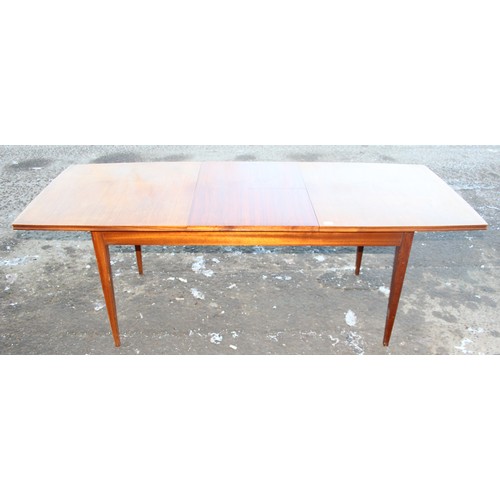 149 - G-plan style extending dining table and 4 upholstered dining chairs, the table unmarked but possibly... 