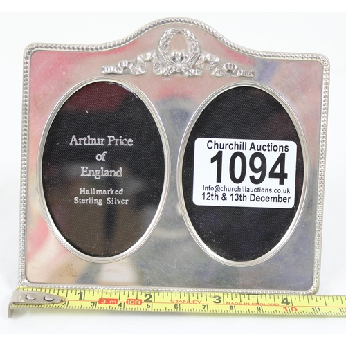 1094 - A small silver double photograph frame by Arthur Price of England, London 2001