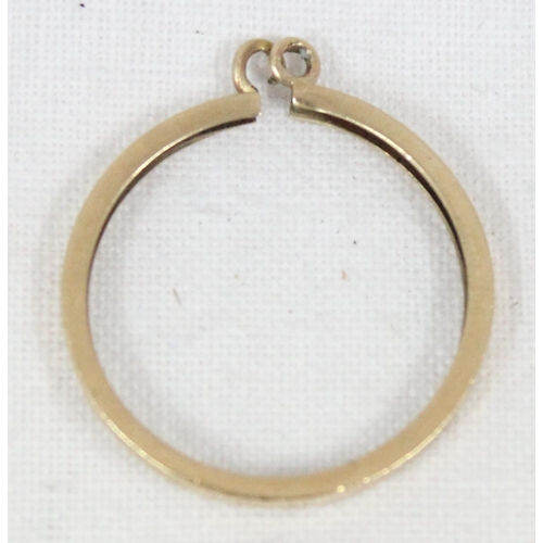 1169 - 9ct gold half sovereign coin pendant mount, marked for Birmingham 1992, approx 0.83g gross