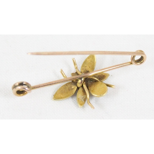 1199N - A vintage gold brooch formed as a bee, set with central pink stone and seed pearls, unmarked but XRF... 