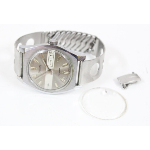 1347 - A retro Orion 83232 2030 calendar watch, in original box with stainless steel strap and paperwork da... 