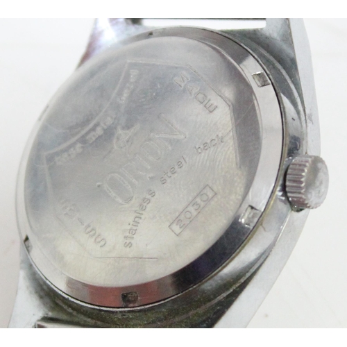 1347 - A retro Orion 83232 2030 calendar watch, in original box with stainless steel strap and paperwork da... 