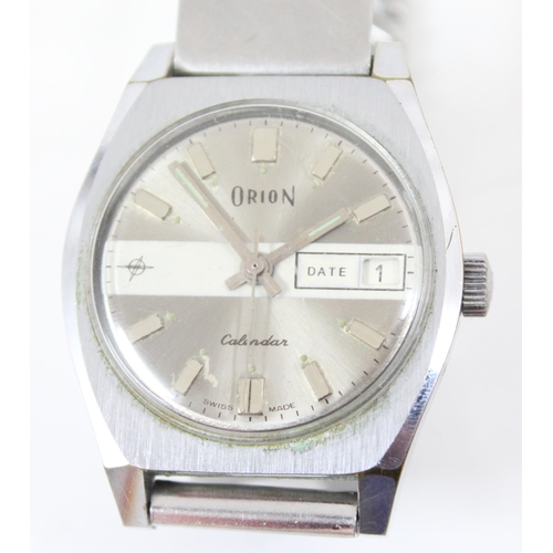 1347 - A retro Orion 83232 2030 calendar watch, in original box with stainless steel strap and paperwork da... 