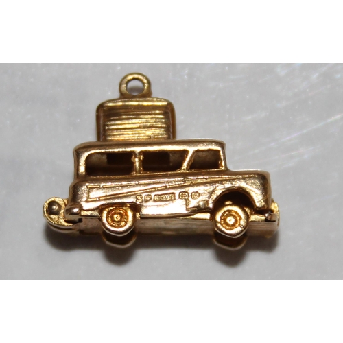 1135 - 9ct gold charm of a camper van with opening interior, Birmingham 1963, approx 4.44g gross