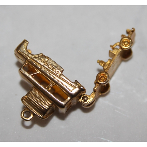 1135 - 9ct gold charm of a camper van with opening interior, Birmingham 1963, approx 4.44g gross