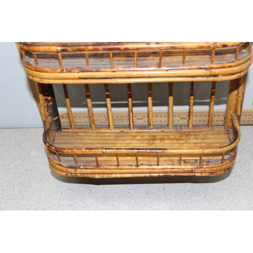 146A - A small vintage/ antique bamboo 3 tier wall shelf