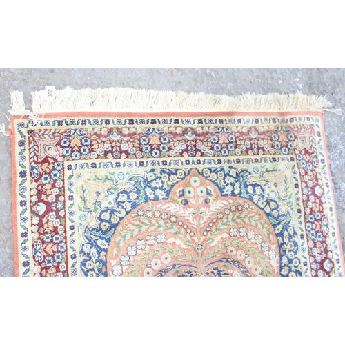 206 - A finely decorated rug of gold ground, approx 165cm x 94cm