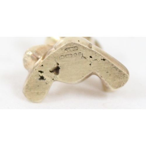 1150A - A heavy cast 9ct gold model of a teddy bear, marked for London 1982, approx 18mm tall, approx 14.34g... 