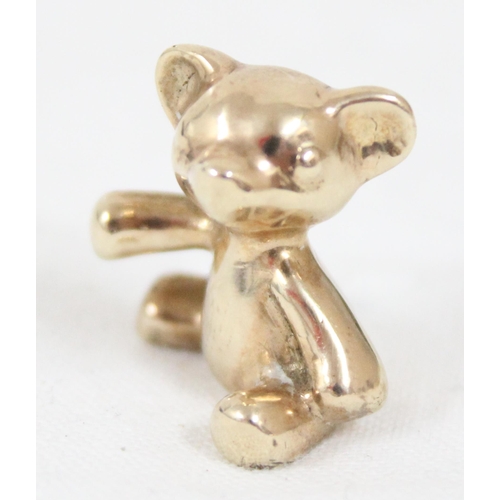 1150A - A heavy cast 9ct gold model of a teddy bear, marked for London 1982, approx 18mm tall, approx 14.34g... 