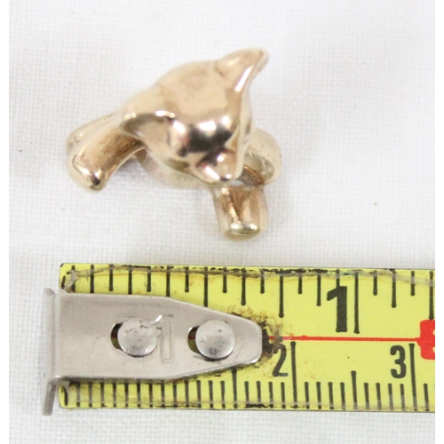 1150A - A heavy cast 9ct gold model of a teddy bear, marked for London 1982, approx 18mm tall, approx 14.34g... 