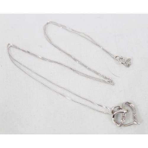 1180 - 9ct white gold heart shaped pendant on chain, set with diamonds, approx 46cm long, approx 1.33g gros... 