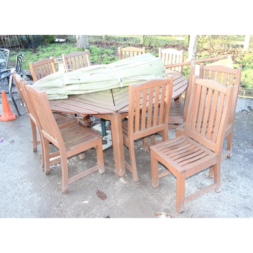 345 - A large hardwood garden table and 10 chairs, retailed by Harrods, table with 4 extensions to be squa... 