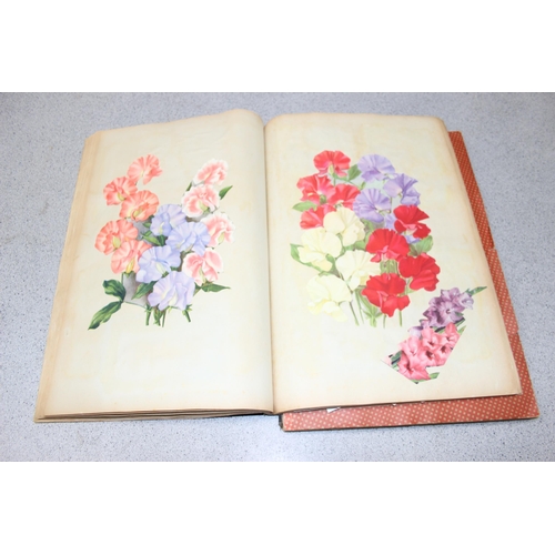 609 - 2 large vintage scrapbooks