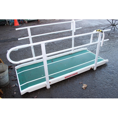 1884 - Semi-permanent wheelchair ramp with hand rails,