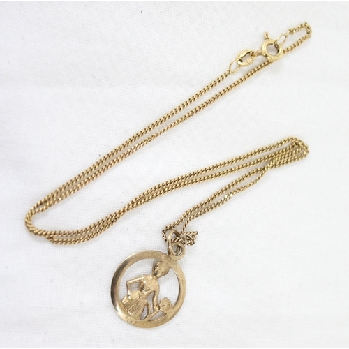 1199Y - An Italian 9ct gold pendant depicting a female with a flower, marked for London 1979, on a 9ct gold ... 