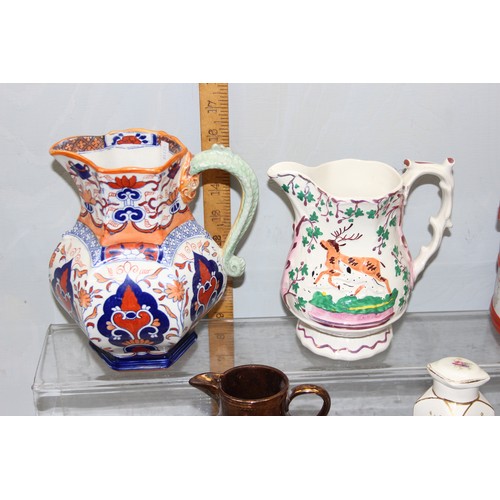 1824 - Mixed lot of ceramics to include Fenton ironstone jugs and an antique blue and white meat charger