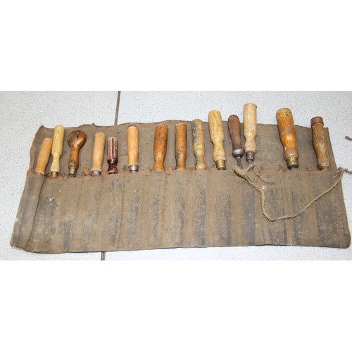 864 - 4 rolls of vintage wood working chisels to include examples by Marples