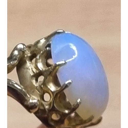 1124 - 18ct gold and opal ring in claw setting, indistinctly marked but XRF tested at 18ct, approx size S, ... 