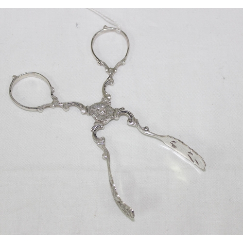 1004 - A pair of Continental, likely German 835 silver sugar tongs, marks to handle, approx 24.21g gross