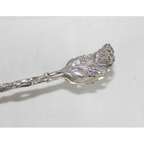 1004 - A pair of Continental, likely German 835 silver sugar tongs, marks to handle, approx 24.21g gross