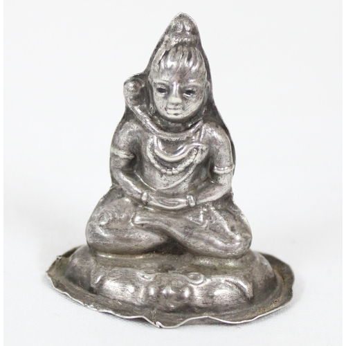 1008 - A seated model of a Buddhist deity, XRF approx 93% pure, and a Spanish silver model of a bullfighter... 