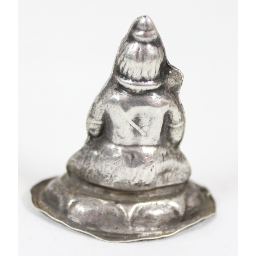 1008 - A seated model of a Buddhist deity, XRF approx 93% pure, and a Spanish silver model of a bullfighter... 