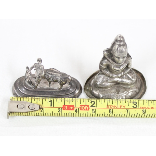 1008 - A seated model of a Buddhist deity, XRF approx 93% pure, and a Spanish silver model of a bullfighter... 