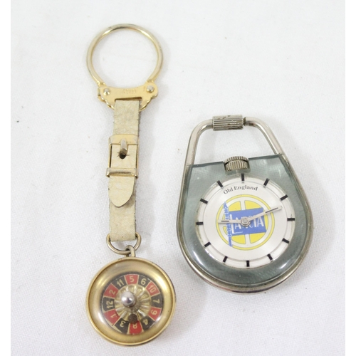 1304 - An unusual 1970's or 1980's Lancia cars advertising keyring watch and a small Italian made keyring r... 