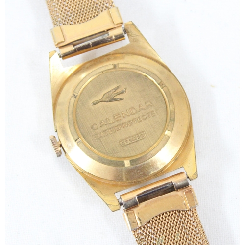 1307 - A mid-century Russian (USSR) made Zheut 21 Medals Calendar watch in gold plated case with gold plate... 