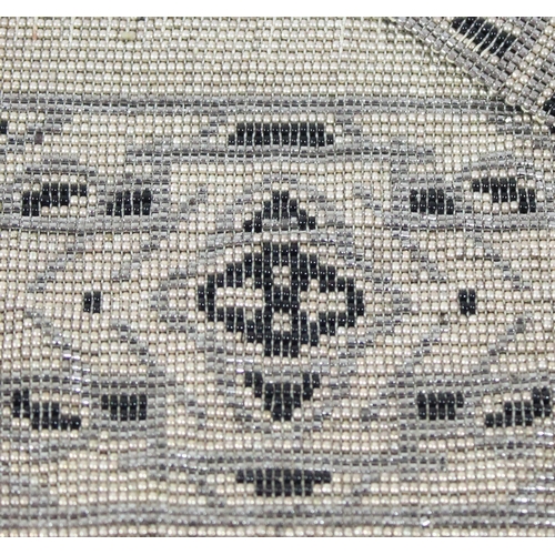 200 - An Art Deco period French made metal beadwork evening bag, KIGU compact and other similar items