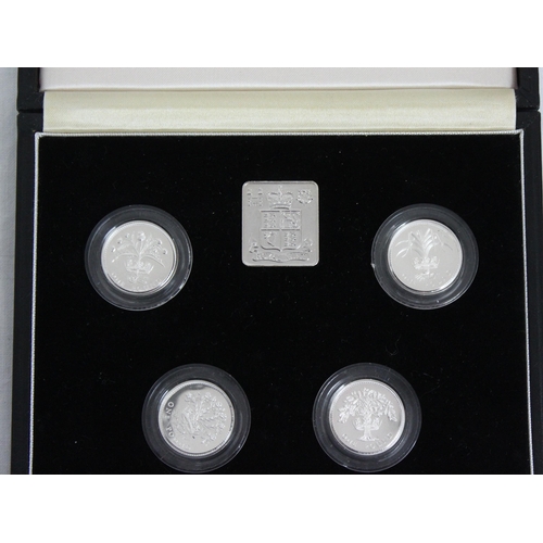 1214 - Royal Mint 1984-1987 United Kingdom £1 silver proof Piedfort Collection, 4 coin set in box with Roya... 