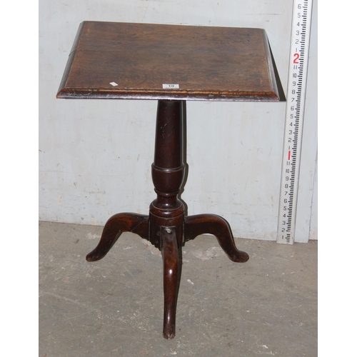 10 - A 19th century oak square table on tripod base, approx 53cm square