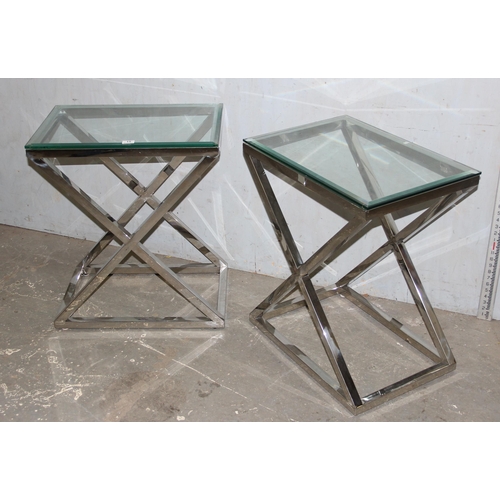 15 - A pair of designer style X frame chrome and glass side tables, the chrome base mounted with a clear ... 