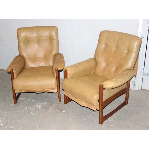 17 - A pair of Scandinavian style retro button backed armchairs