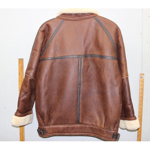 201 - A vintage sheepskin lined suede leather jacket, size 14