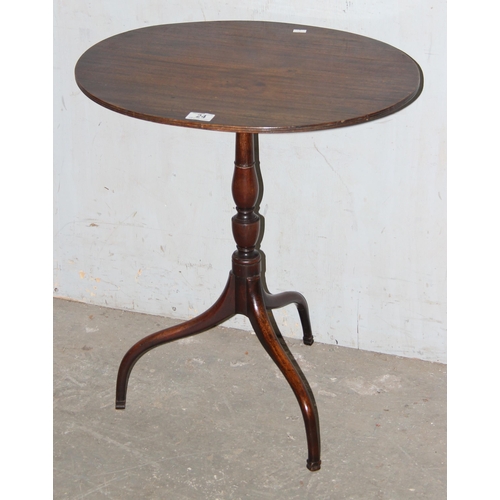 24 - An antique mahogany topped wine table with tripod base, approx 55cm wide