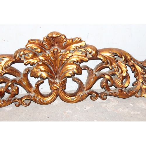 36 - A Rococo style gilt wall mounted pediment, approx 130cm wide