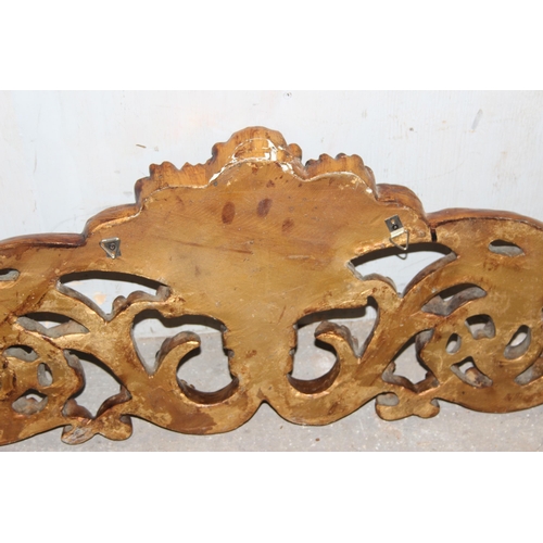 36 - A Rococo style gilt wall mounted pediment, approx 130cm wide